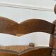 Low fireplace chair in the style of Charles Dudouyt