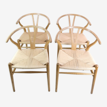 Ensemble de quatre chaises, modèle CH24, conçu par Hans J. Wegner en chêne en 1950