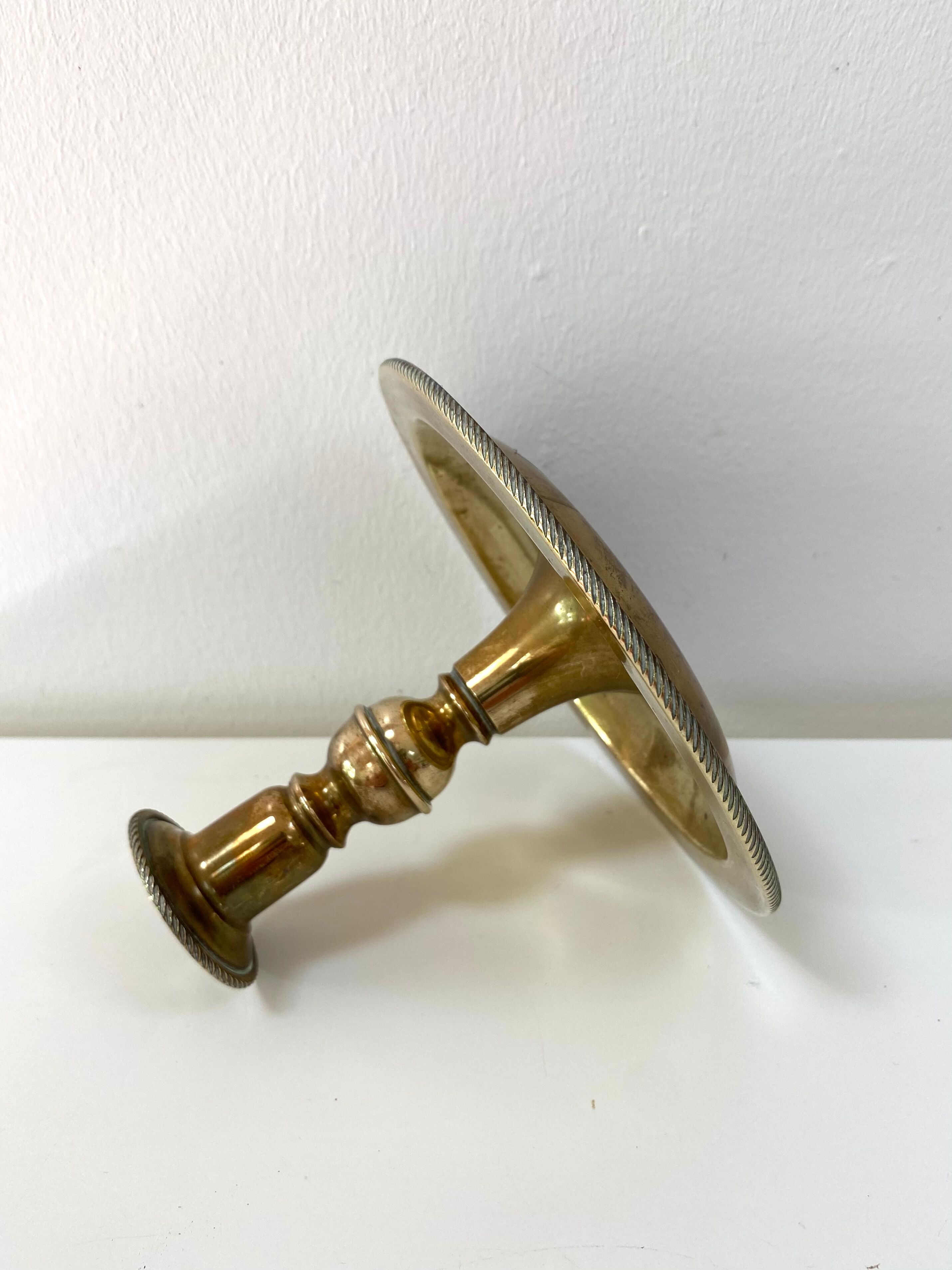 Antique brass candle holder