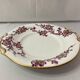 Old earthenware serving dish decorated flowers and gold around 1900