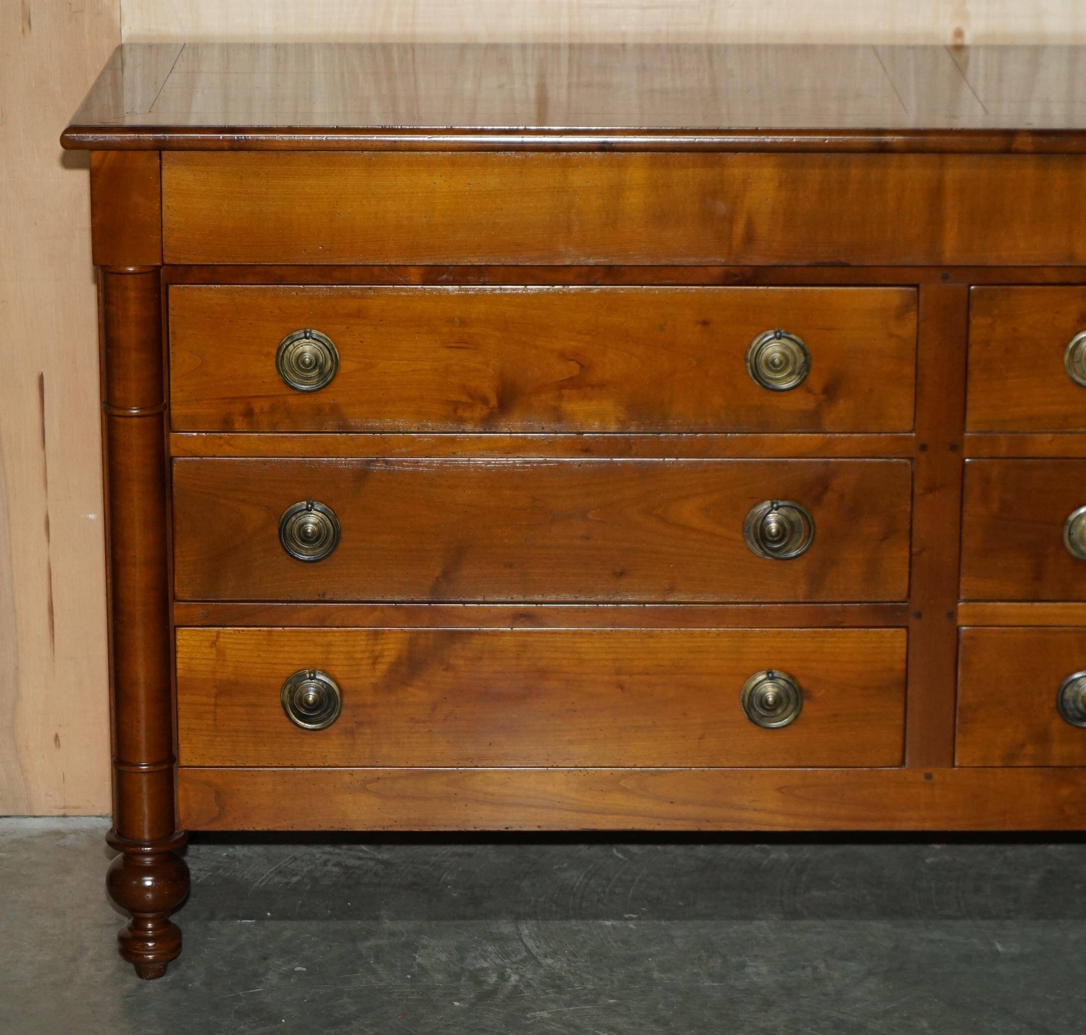 Vintage low cabinet from Grange made of cherry wood.