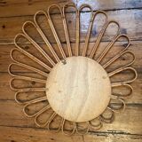 Old vintage asymmetrical round rattan mirror