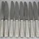 12 table knives model Grand Prix, Art Deco, silver-plated, in excellent condition.