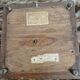Antique musical trivet made of carved wood and Belle Époque earthenware.