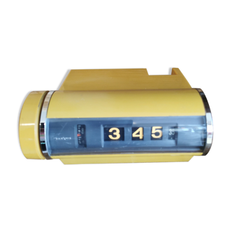Yellow vintage sankyo alarm clock