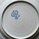 Set of 8 mismatched antique ironstone deep plates.