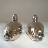 Salt and pepper shaker on silver metal tray in the shape of a duck art deco style
