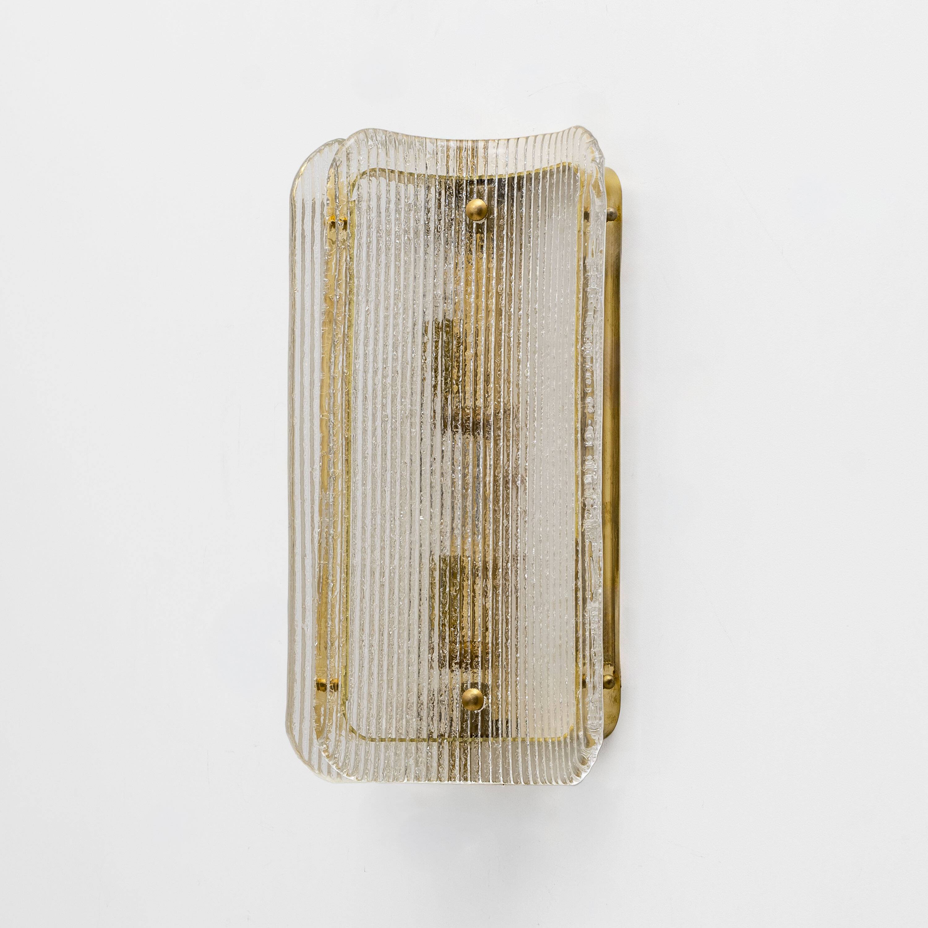 Pair of Curved Clear Ribbed Murano Glass and Brass Wall Sconces