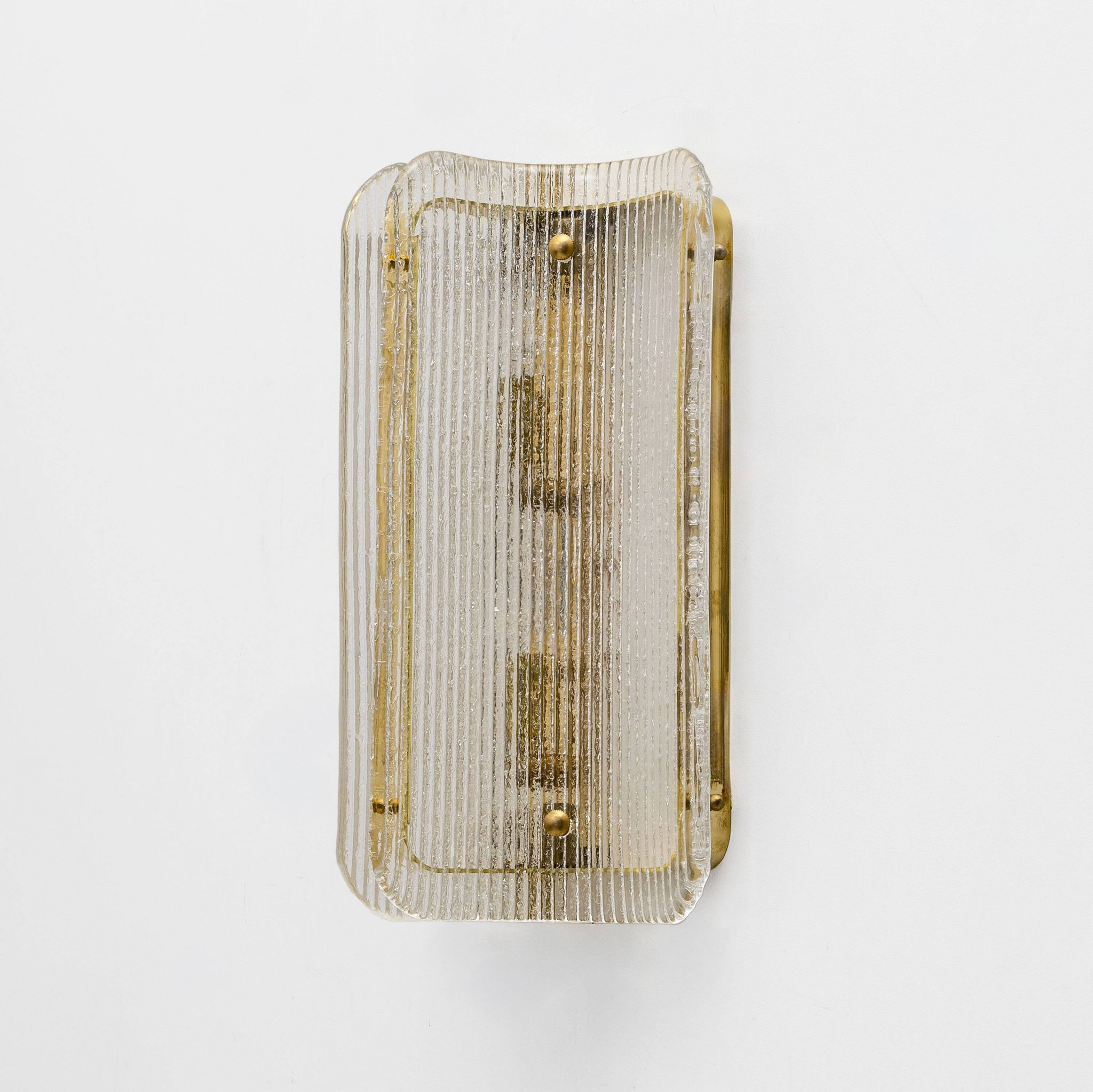 Pair of Curved Clear Ribbed Murano Glass and Brass Wall Sconces