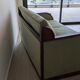 2-seater Art Deco sofa — Wooden frame, sage green fabric