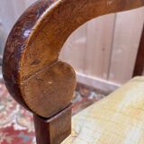 Pair of 19th-century armchairs with a scrolled back