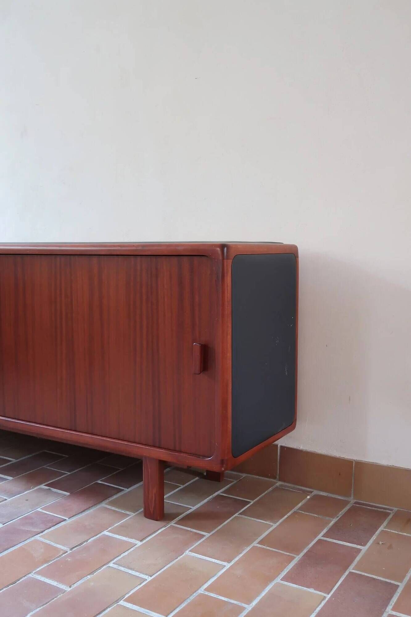 Teak enfilade, sliding doors, black faux leather top, 1970s.
