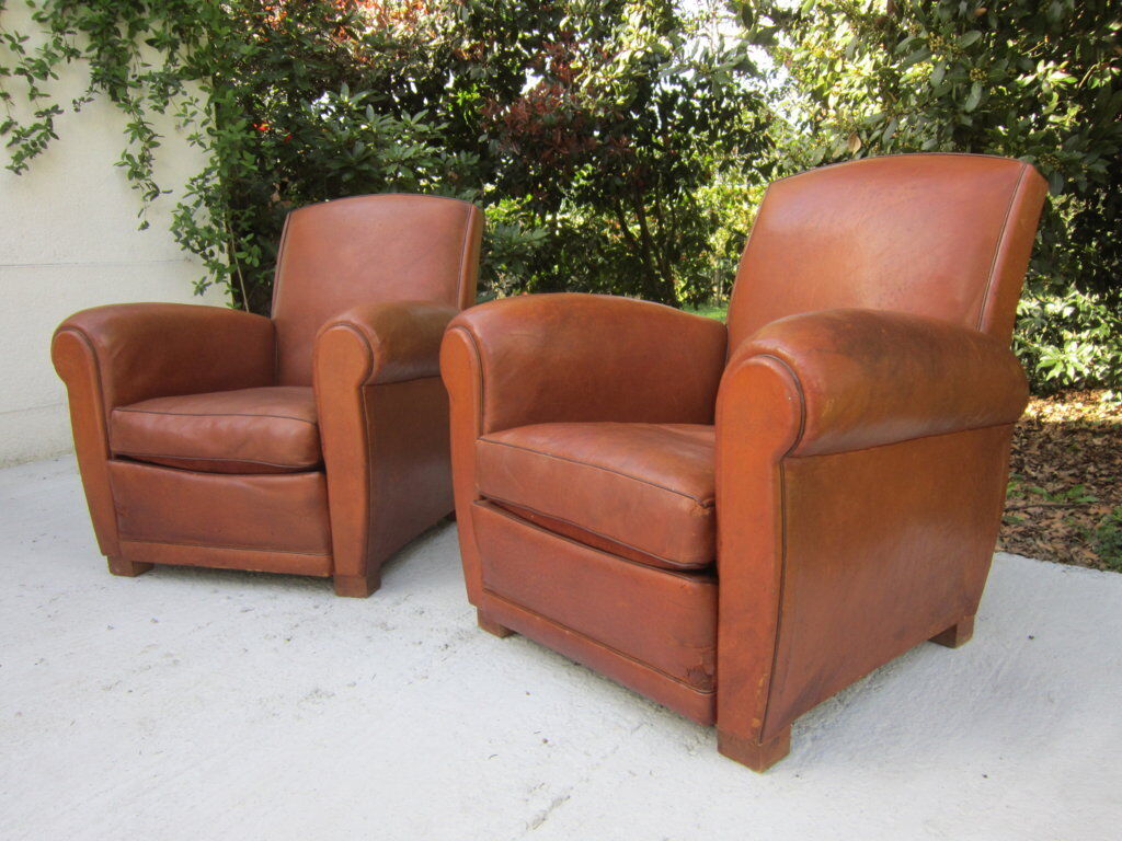 Paire de fauteuils club en cuir