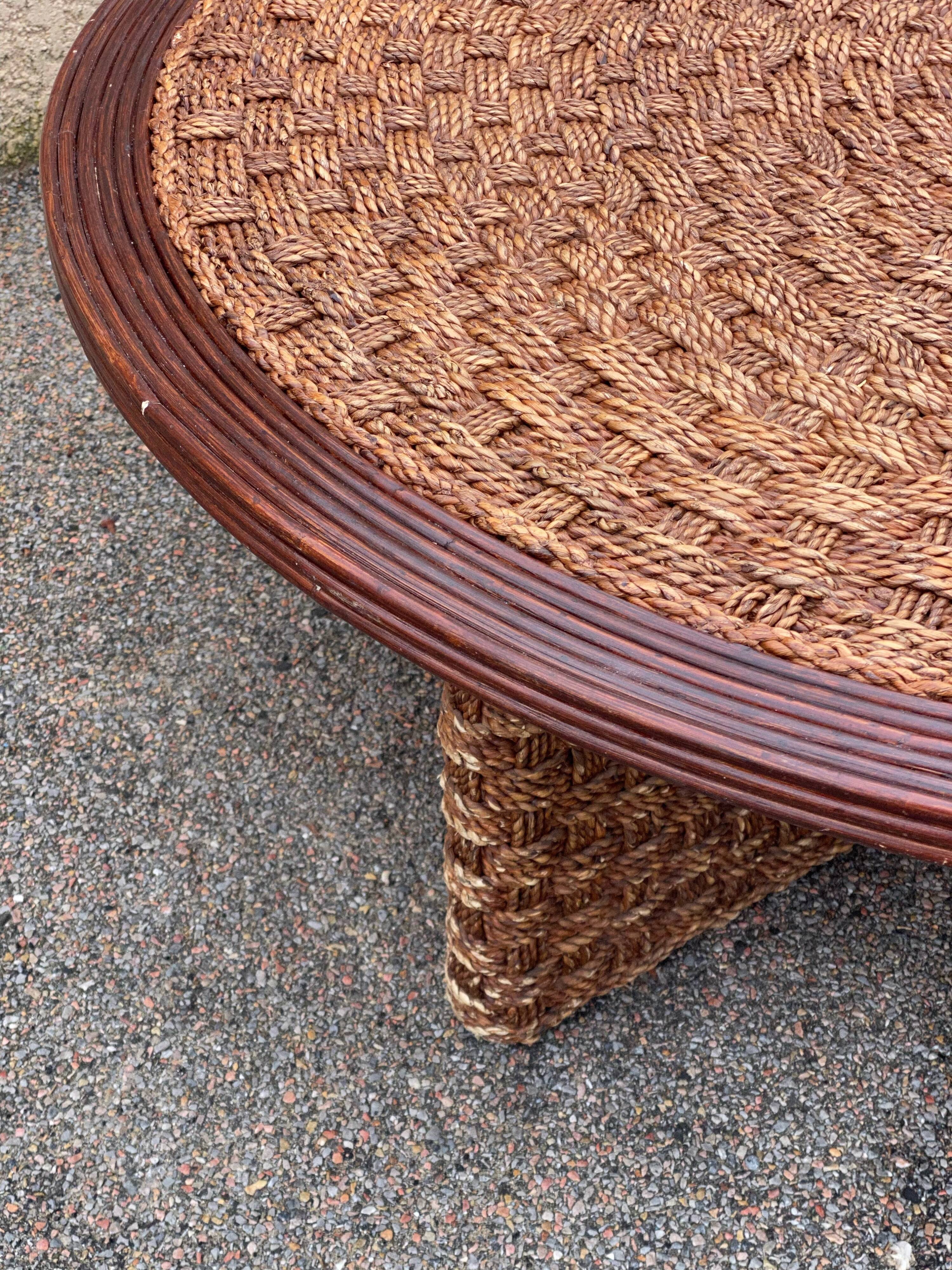 A coffee table and four rope stools 1960/1970
