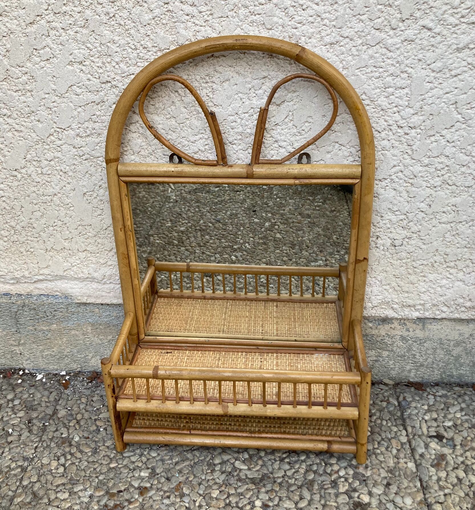 Vintage rattan wall shelf with mirror