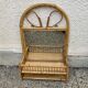 Vintage rattan wall shelf with mirror