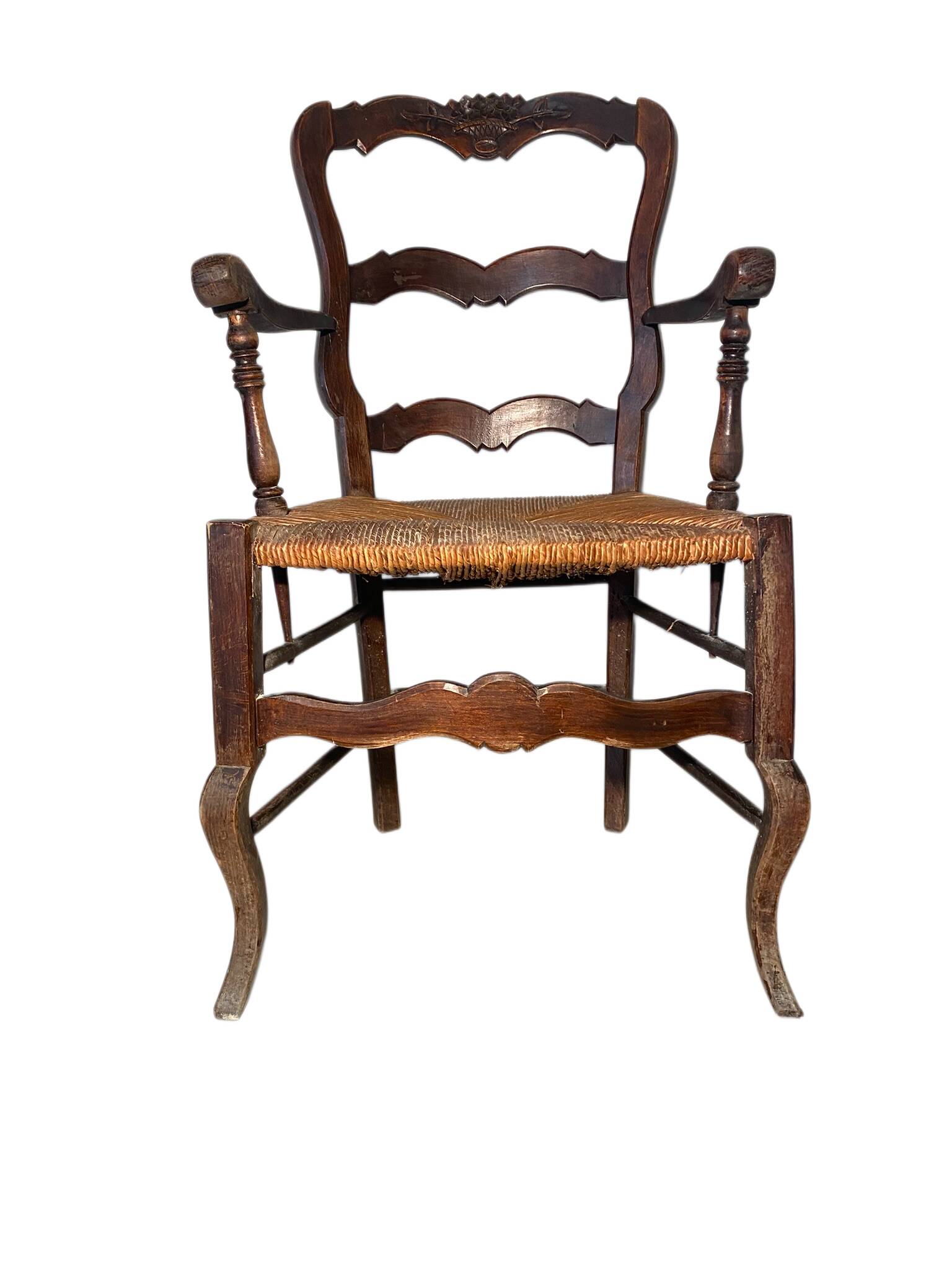 Antique Provencal armchair in carved wood with straw seat