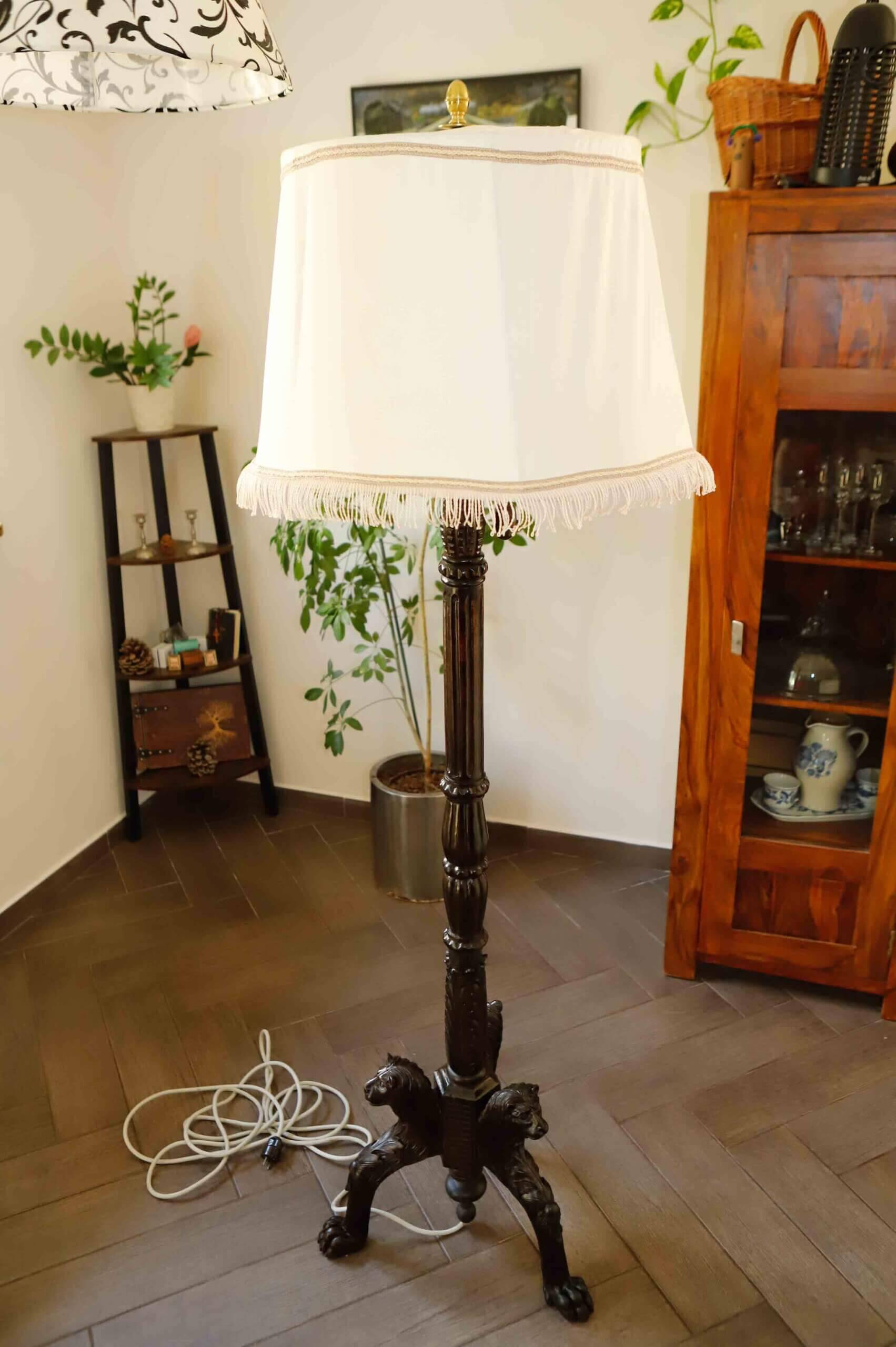 Antique floor lamp with lion motif