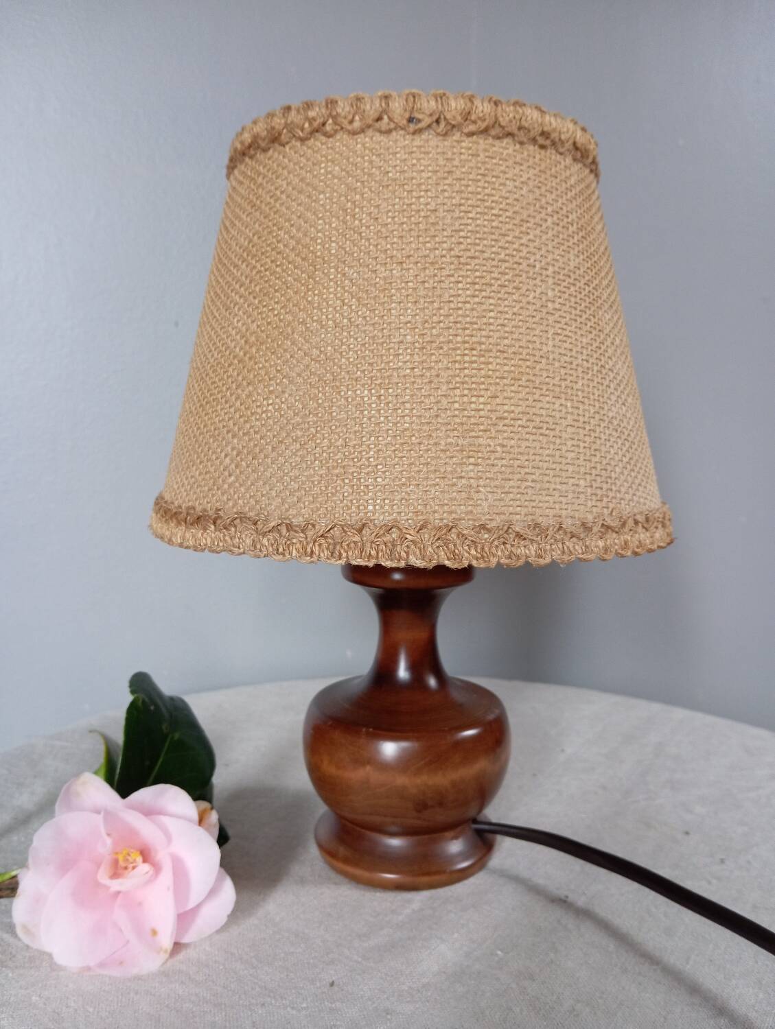 Dark stained turned wood table lamp, camel jute lampshade 1960