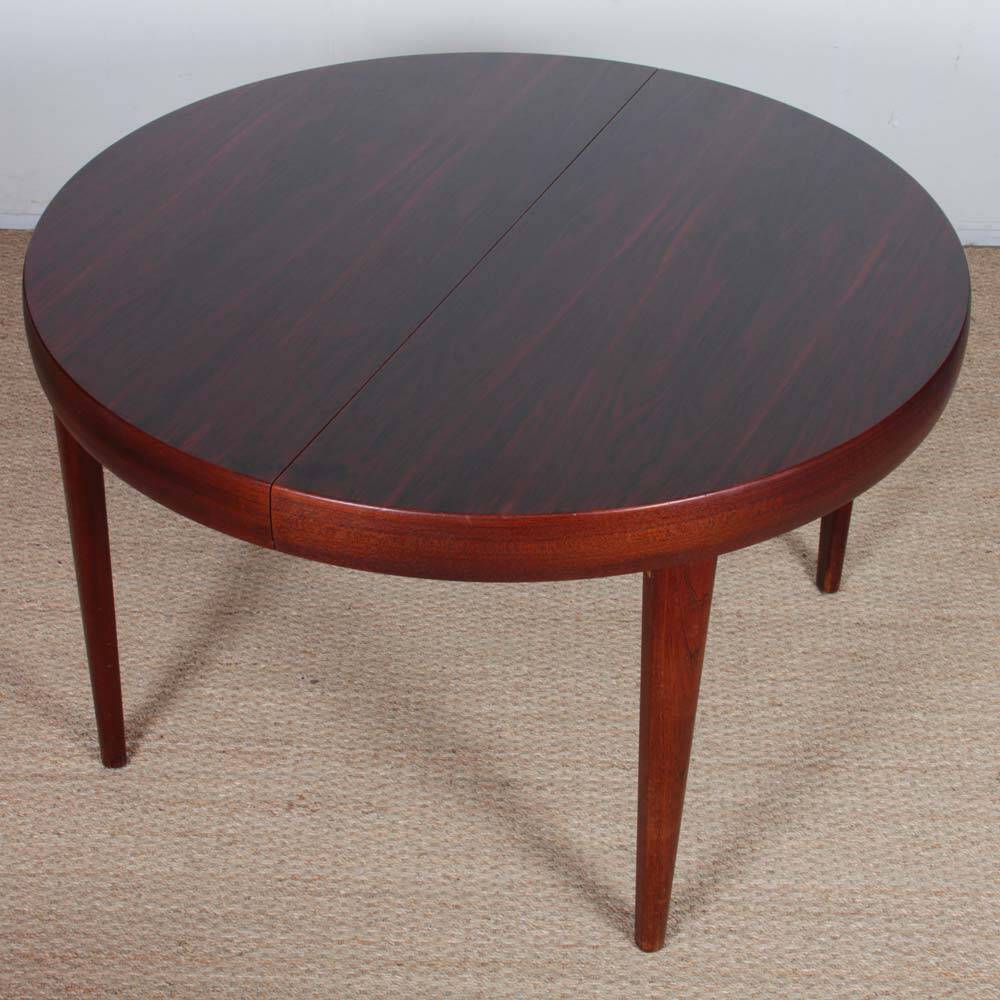 Round extendable dining table in Rio rosewood, 1960
