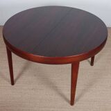 Round extendable dining table in Rio rosewood, 1960
