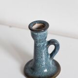 Antique candle holder in glazed ceramic