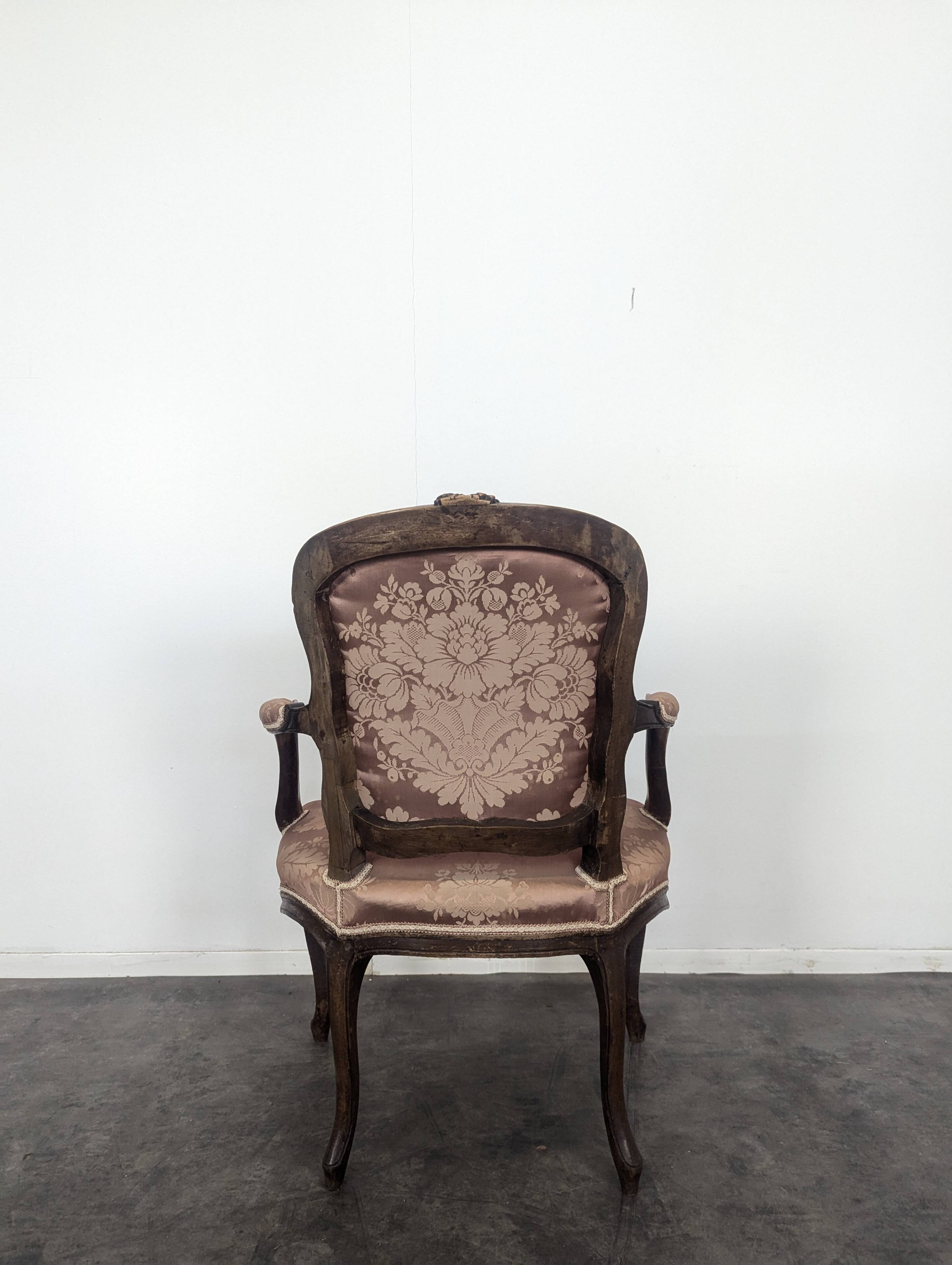 Pair of Louis XV period oak armchairs