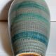 Ceramic vase scarified with gray-blue enamel