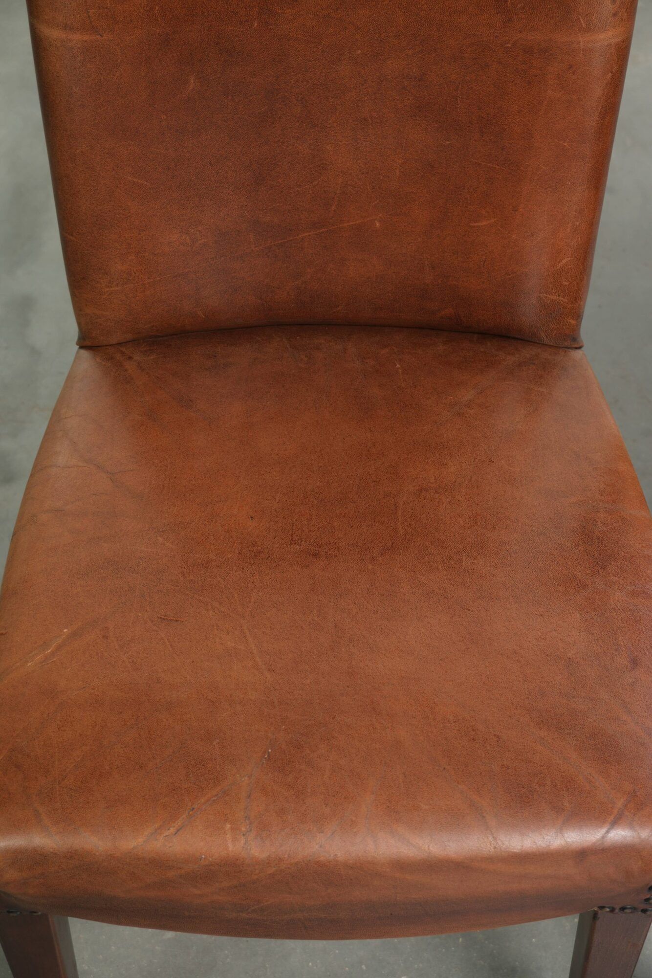 Set of 6 sheepskin dining chairs in a cognac colour with a lovely patina