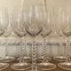 Set of 9 tall twisted and engraved crystal wine glasses