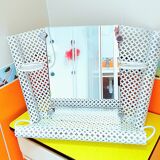 Perforated sheet metal bathroom shelf