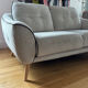 Grey two-seater sofa