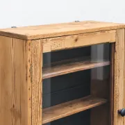 Antique wall display cabinet in natural wood and black – small glass-fronted collector's piece.