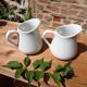 2 vintage milk jugs