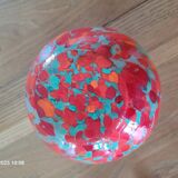 Old multicolored glass flower vase