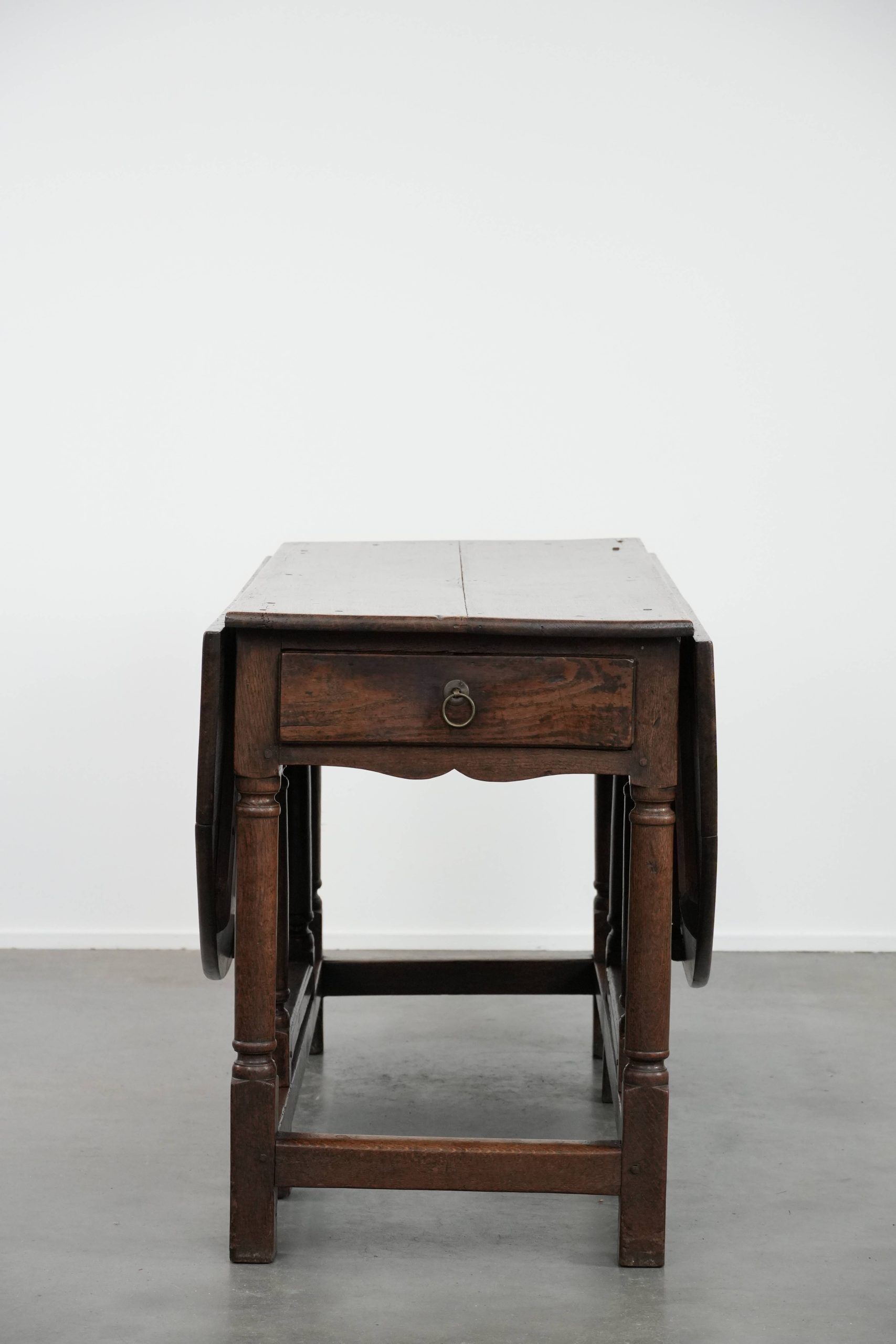 Antique English oak side/dining/gateleg table from the 18th century