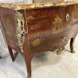 Louis XV style commode in red lacquer from the 1900s.