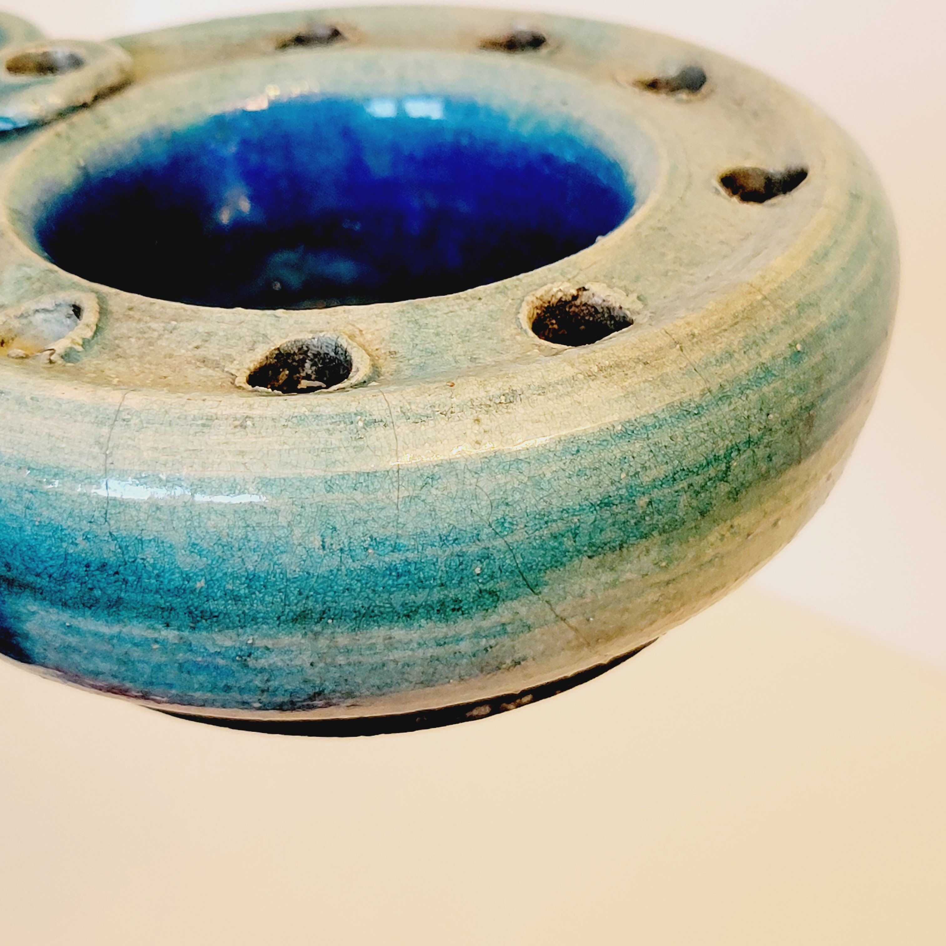 Pique flowers or pikes blue ceramic candles