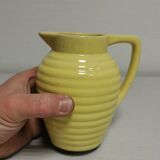 Yellow pitcher in slurry, faience onnaing frères