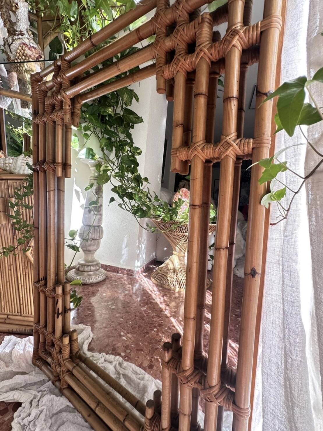 Large sculptural mirror handmade from natural bamboo and woven rattan, 1960.