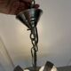 Vintage chandelier with 4 glass bubble globes and silvered metal.
