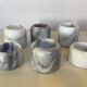 Six bougeoirs en marbre