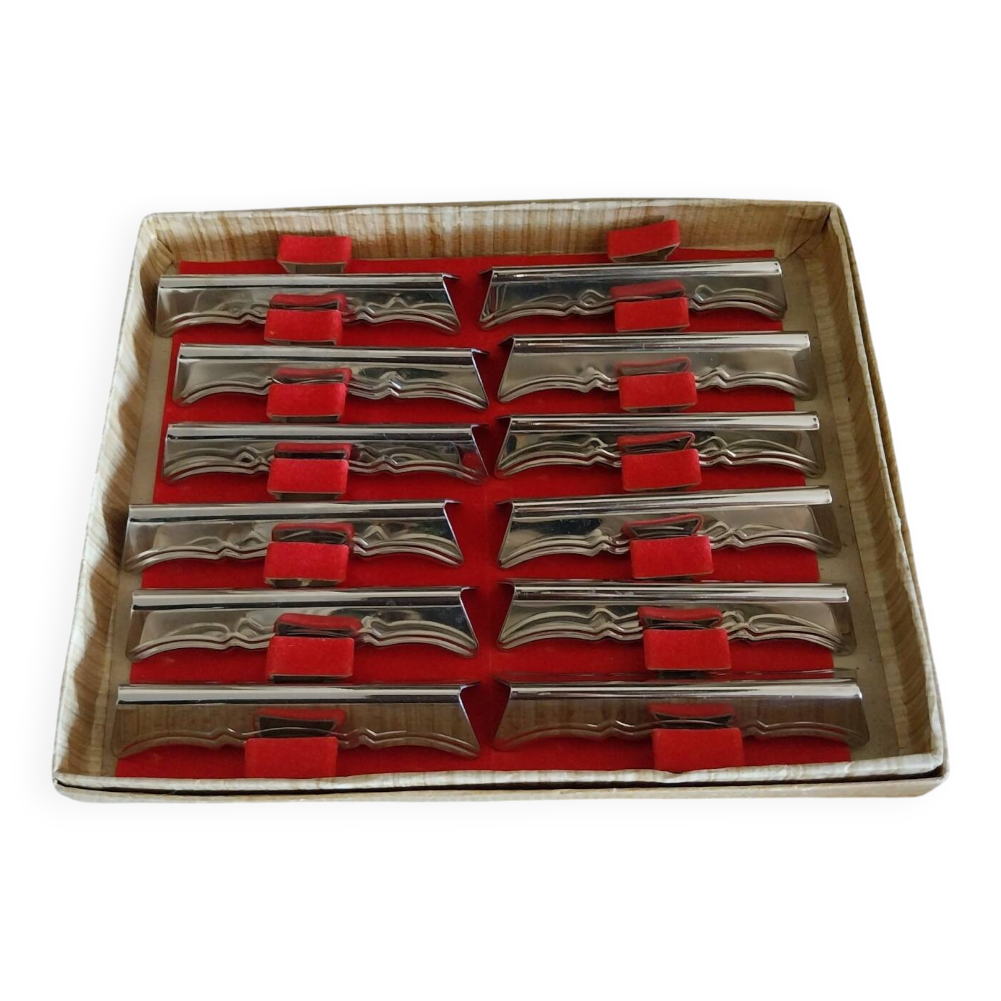 Old metal knife rests