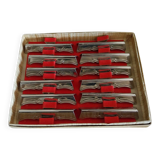 Old metal knife rests