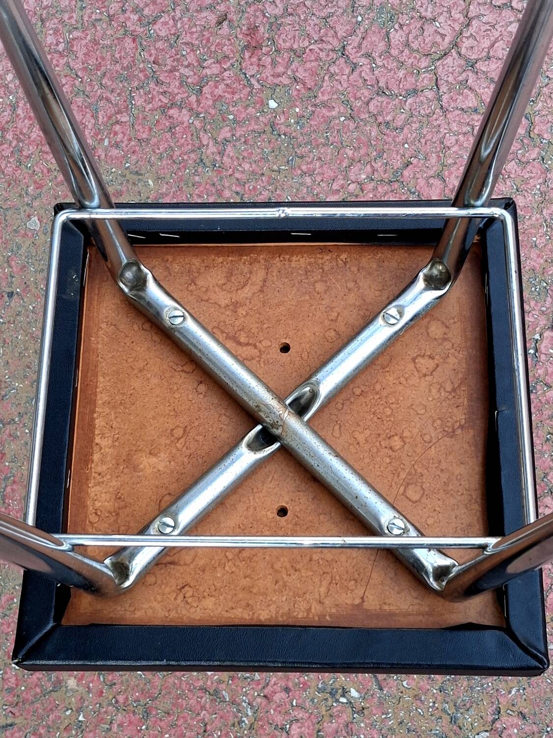 Black faux leather and chrome stool. 1970s, vintage seventies decor.
