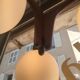 Lustre boomerang scandinave en teck  3 globes en opaline