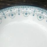 Large round ironstone serving dish from the Moulin des Loup earthenware factory