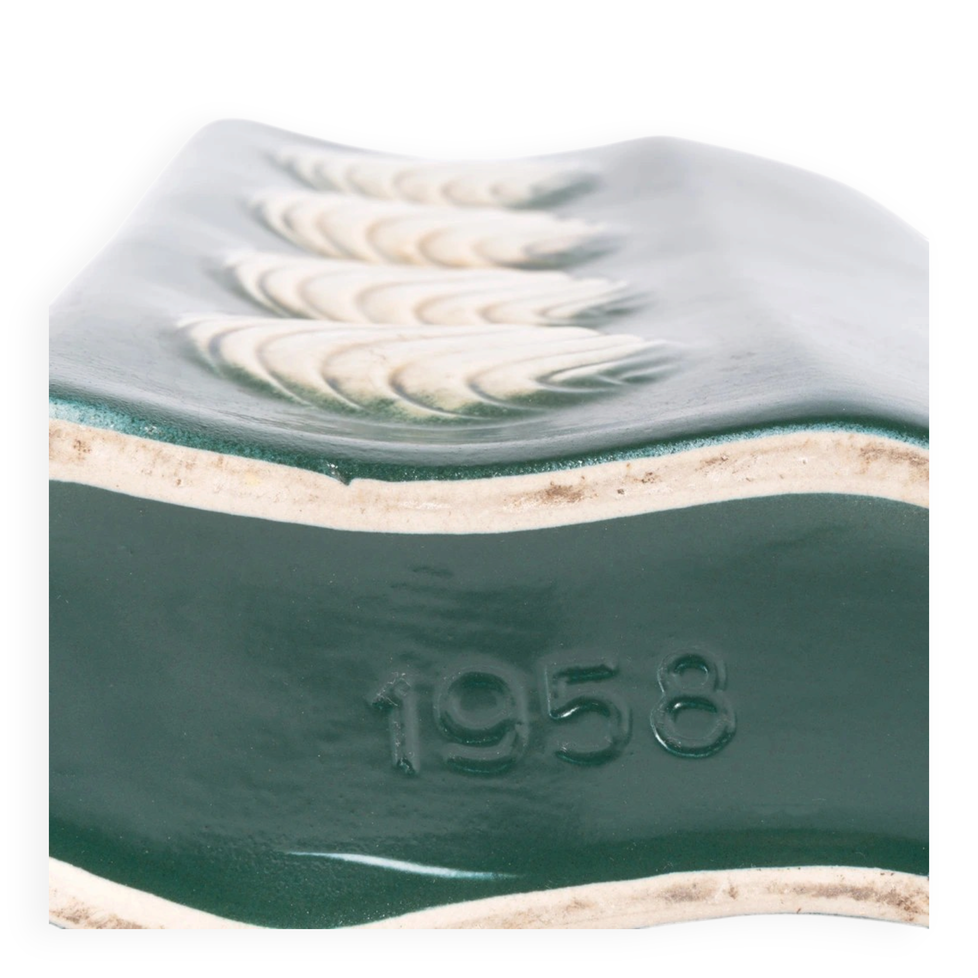 A tall ceramic vase glazed with dark green colour