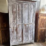 Large Parisian oak wardrobe from the early 20th century with an antique white patina