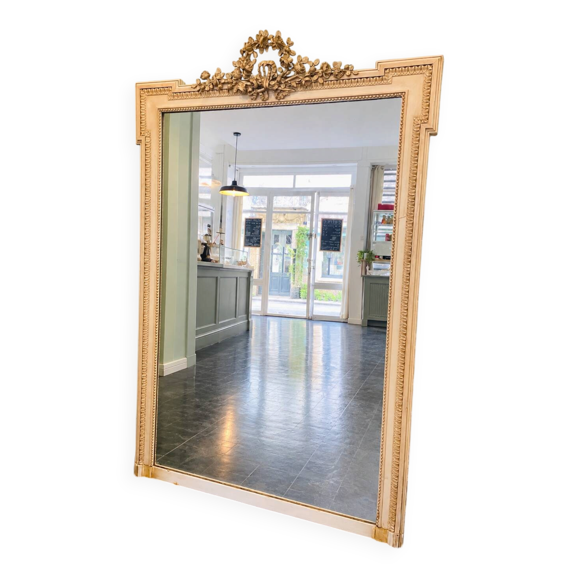 large antique mirror with richly carved pediment in Louis XV / Napoleon style